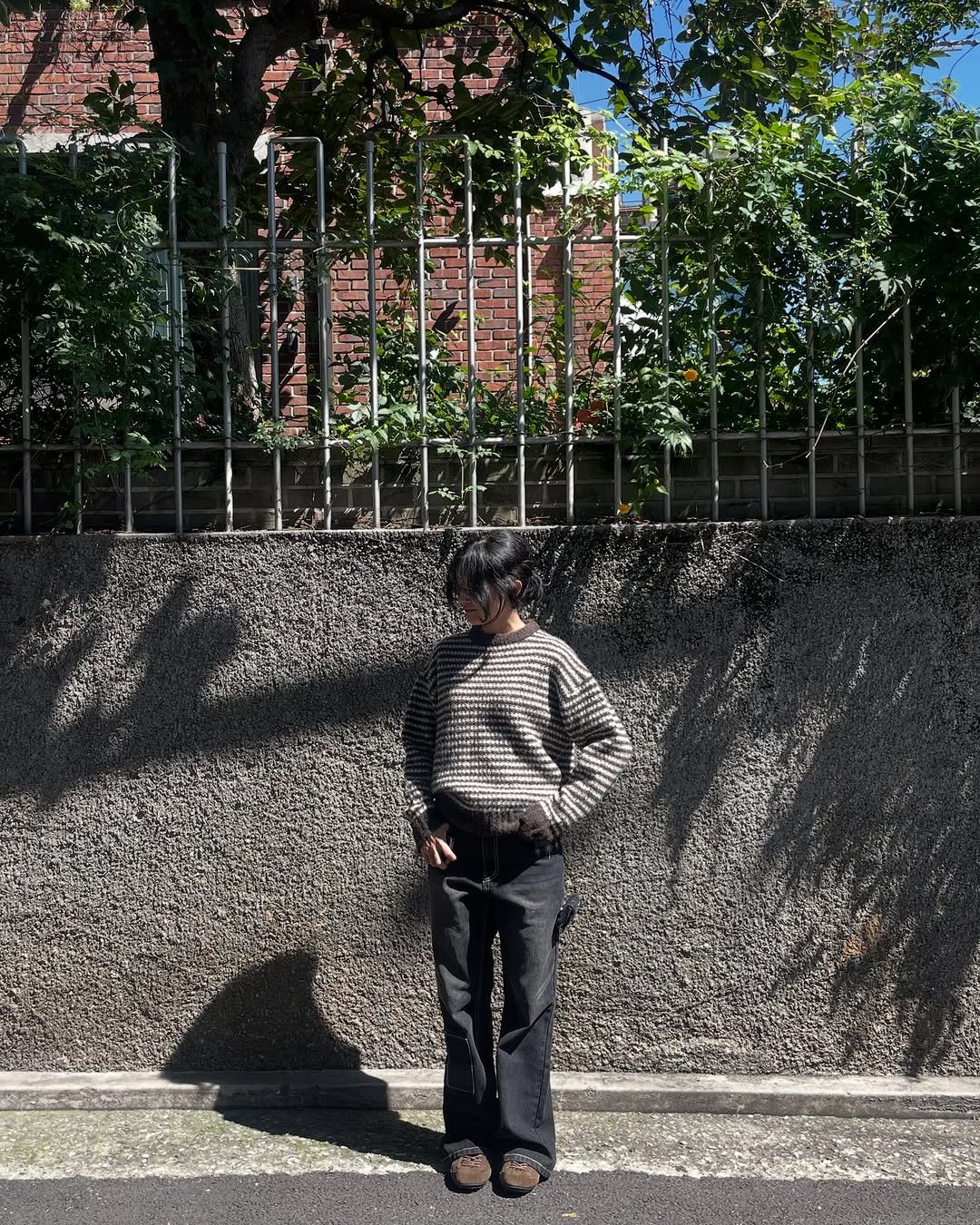 Photo by Supersub on September 14, 2025. May be an image of 1 person, street, curb and text.