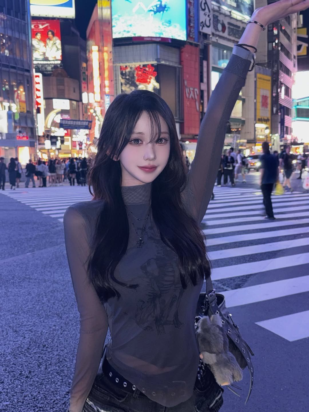 Photo by 수야 すや on October 09, 2025. May be an image of Times Square and text.