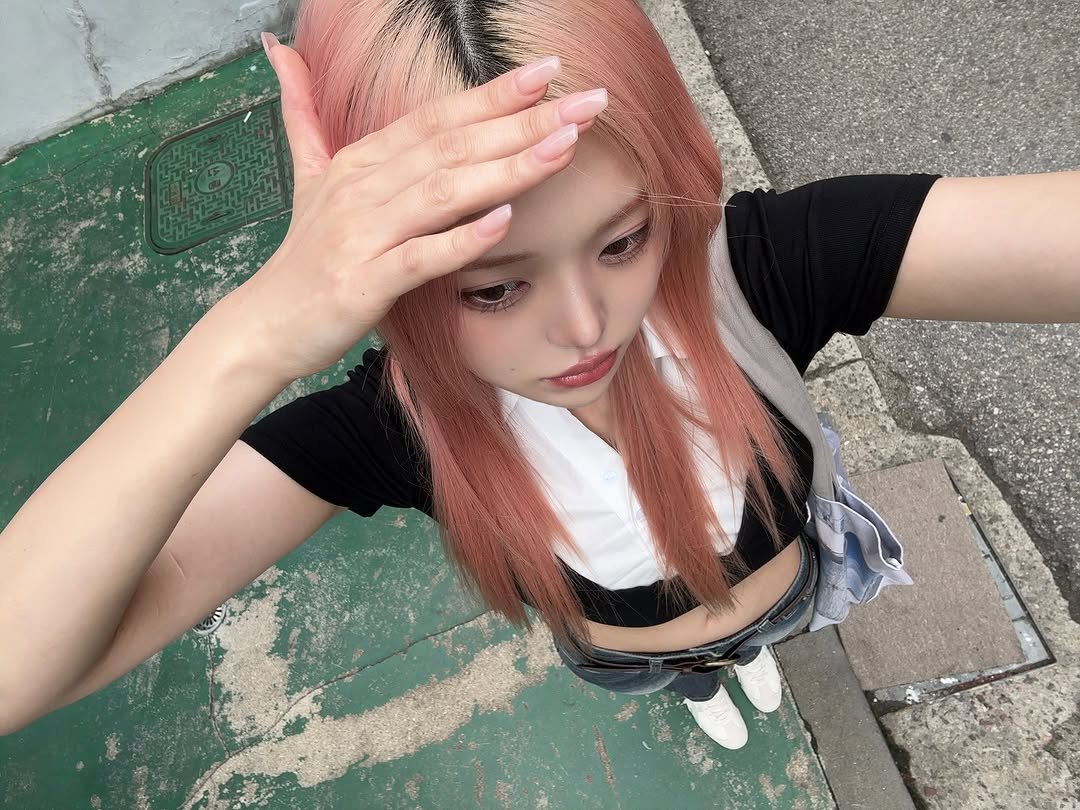 Photo by 🏮 珊瑚 SANGO 🏮 on May 28, 2025. May be an image of 1 person, braids and text.