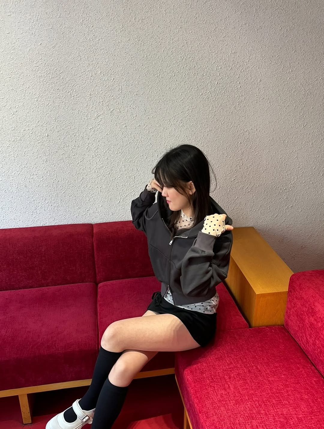 Photo by 세영 on December 11, 2025. May be an image of shorts, miniskirt, fishnet stockings, sweatshirt and text.