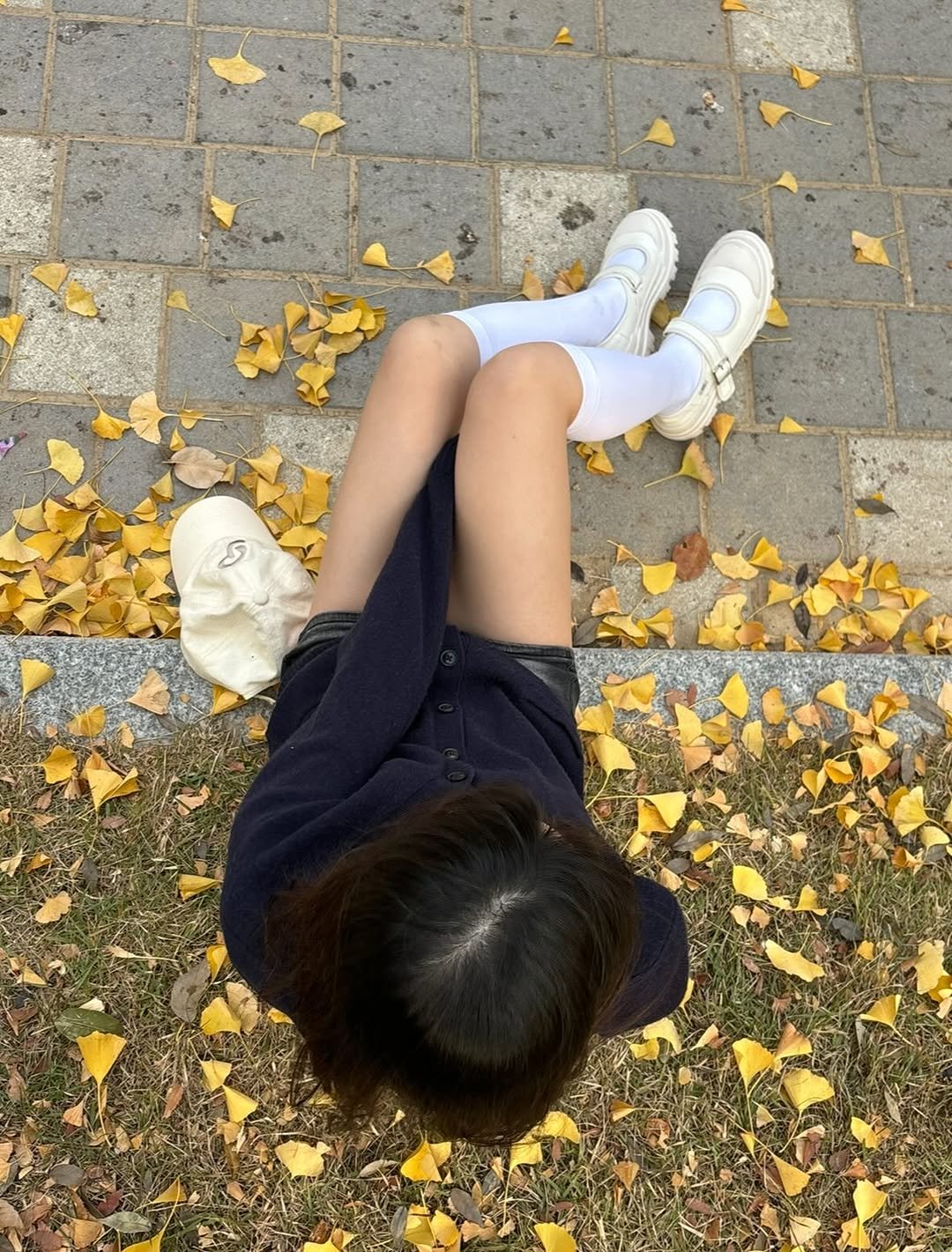 Photo shared by 세영 on December 01, 2025 tagging @heallish_. May be an image of sock, devilwood and curb.