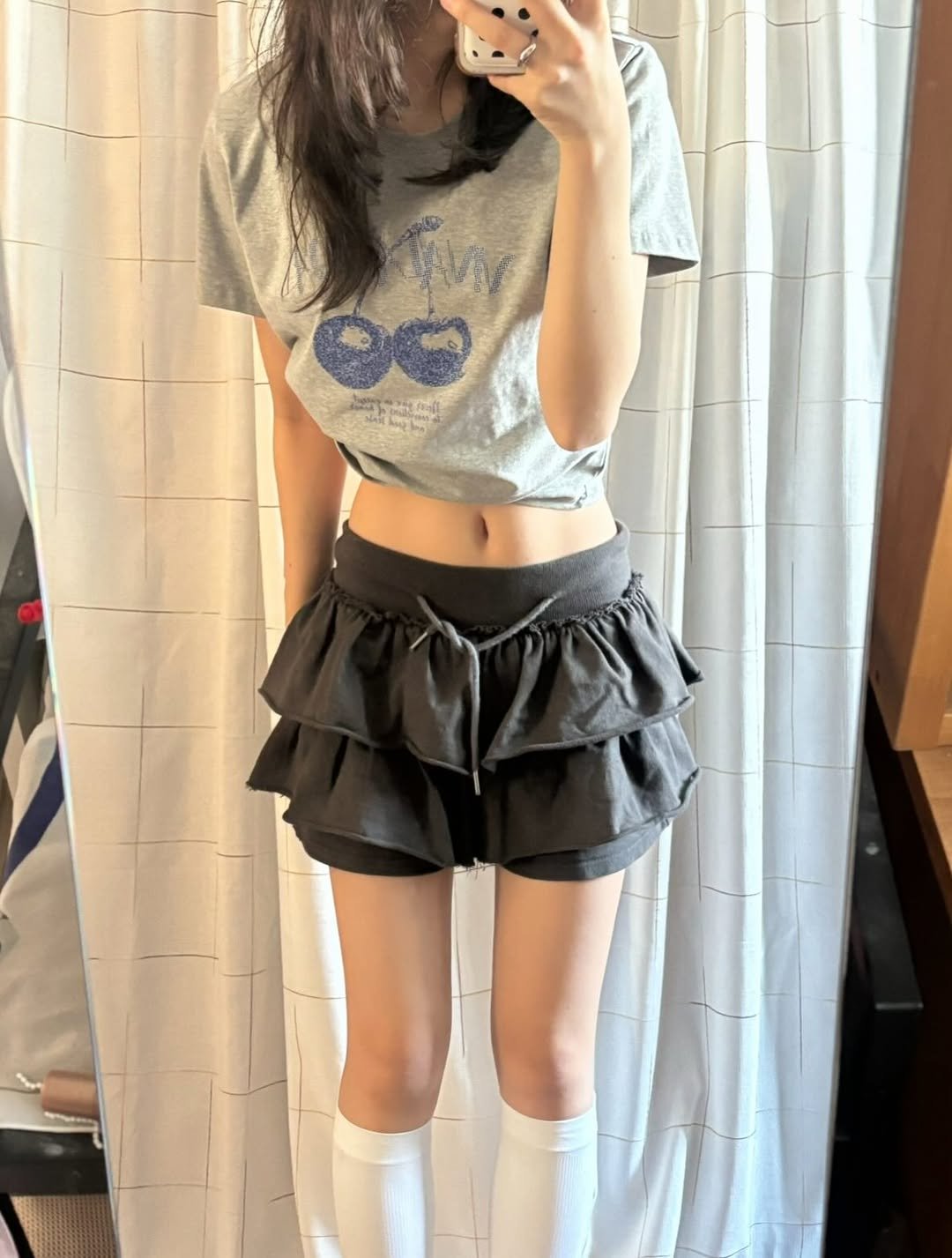 Photo by 세영 on December 15, 2025. May be an image of skirt, shorts, miniskirt and text.