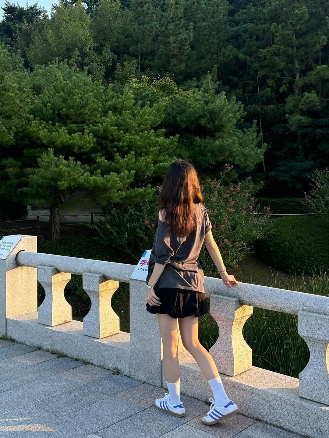 Photo by 세영 on September 13, 2025. May be an image of 1 person, miniskirt, outdoors and text.