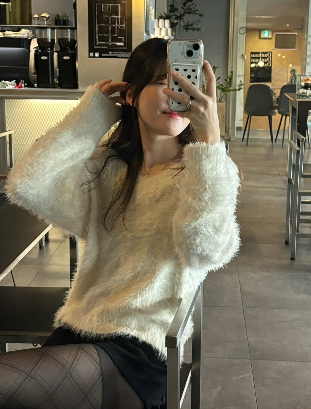 Photo by 세영 on December 05, 2025. May be a selfie of one or more people, hair, sweater, miniskirt, tights, top, turtleneck, knit and text.