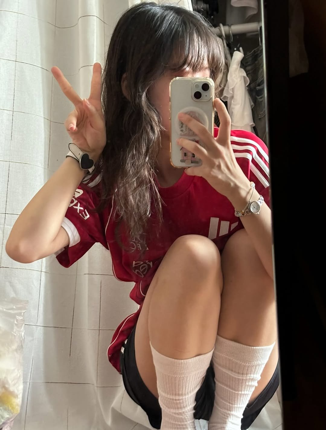 Photo by 세영 on September 18, 2025. May be an image of 1 person, hair, shorts, sock and text.