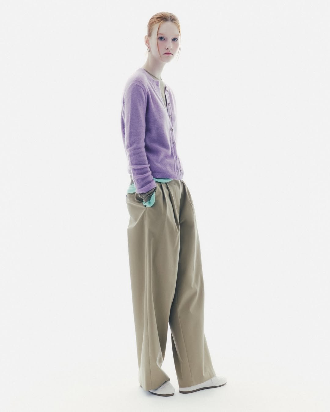 Photo by SYSTEM, SYSTEM HOMME on September 04, 2025. May be an image of 1 person, turtleneck and text.