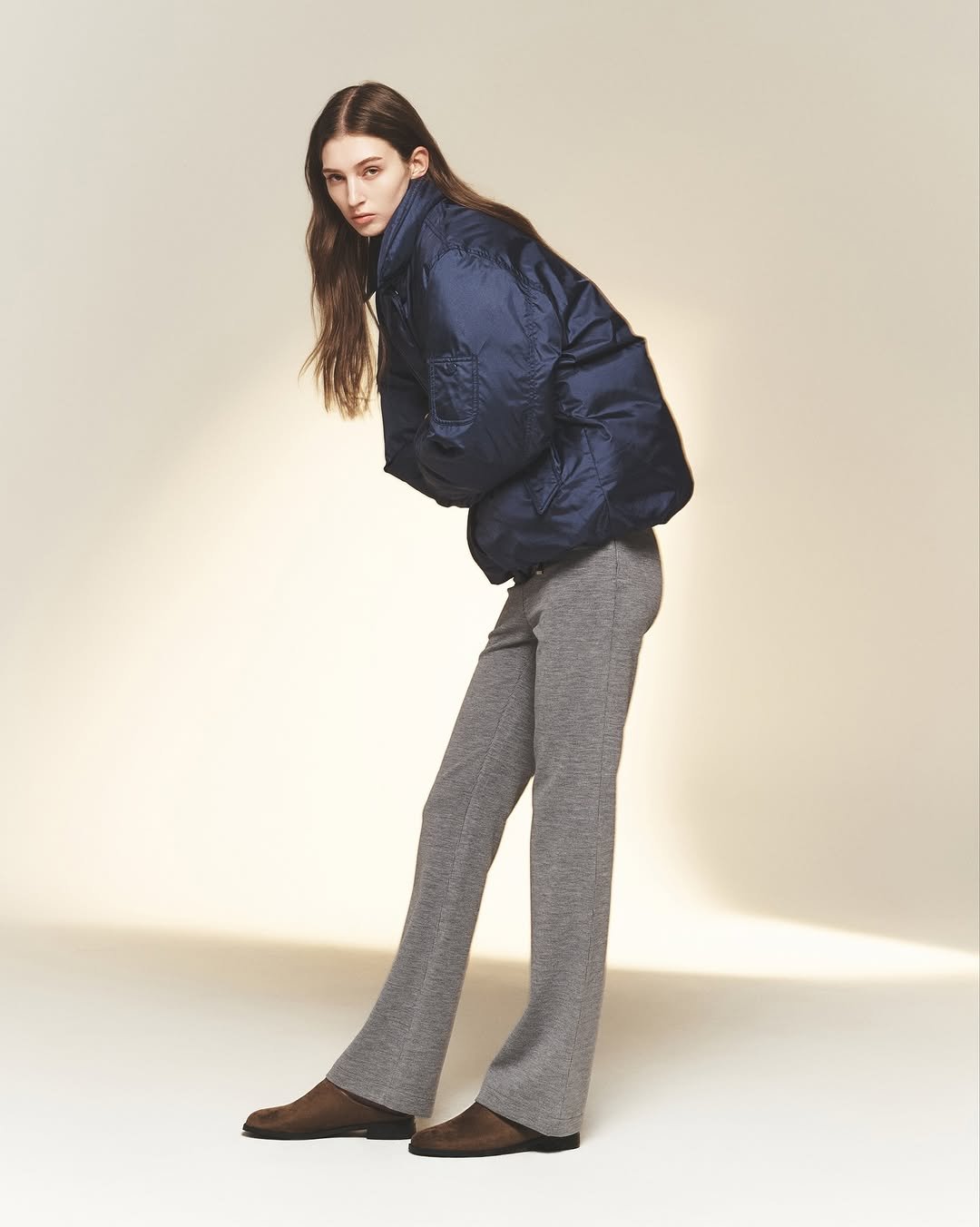 Photo by SYSTEM, SYSTEM HOMME on November 24, 2025. May be an image of goosedown coat, fleece, flight jacket and text.