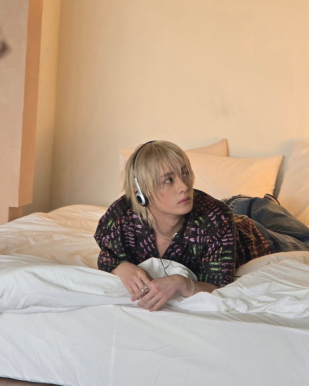 Photo shared by Lee Know on October 24, 2025 tagging @gucci, and @harpersbazaarkorea.