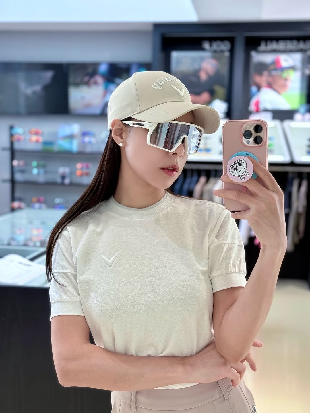 Photo shared by KLPGA 프로골퍼 김타미 on July 16, 2025 tagging @rudyprojectkr. May be a selfie of 1 person, eyewear, hat, sportswear, top, mirror and text.