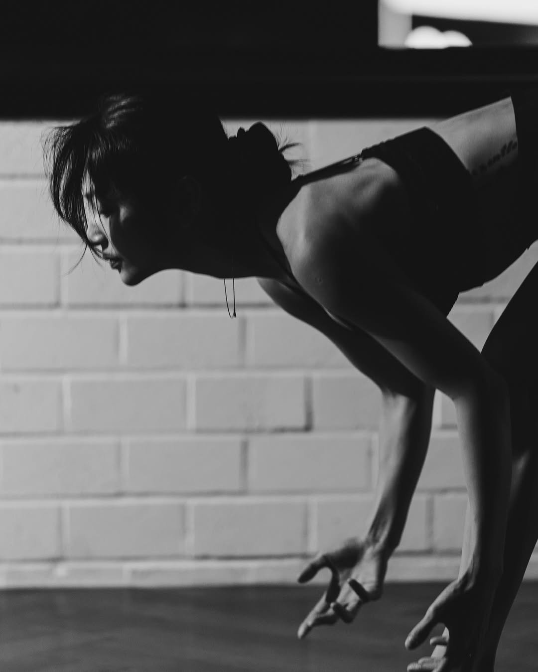 Photo shared by 필라테스 김태희 pilates taeheekim on October 22, 2025 tagging @taeheezzzzang, @logan___poto, and @tapt_pilates. May be a black-and-white image of yoga and dancing.