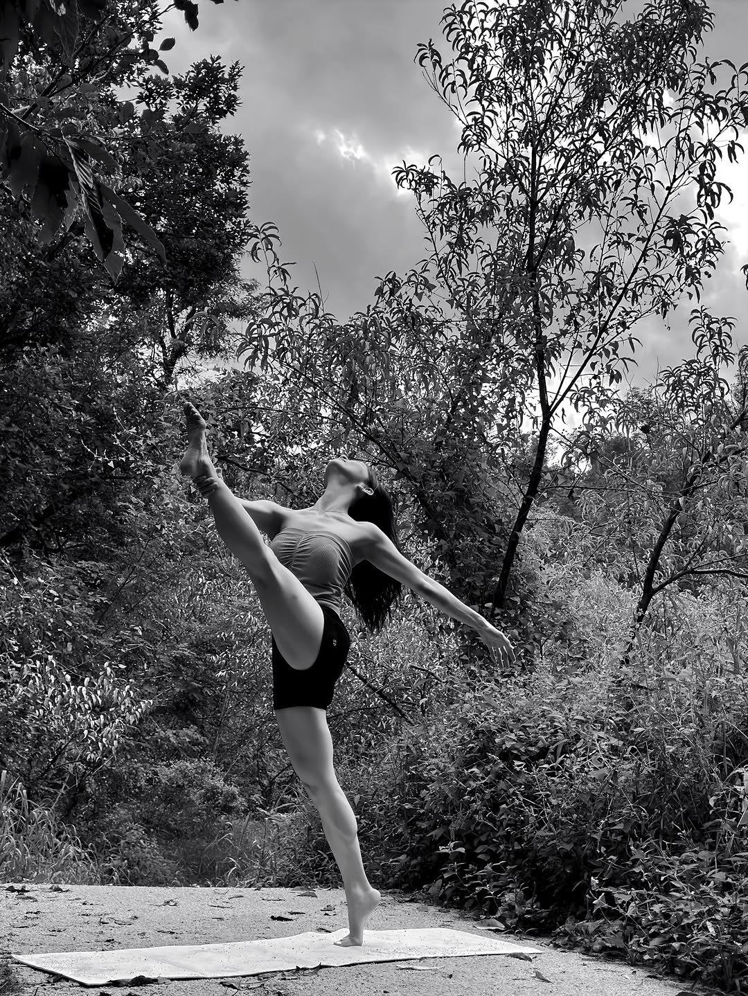 Photo shared by 필라테스 김태희 pilates taeheekim on October 07, 2025 tagging @tapt__official. May be a black-and-white image of 1 person and dancing.