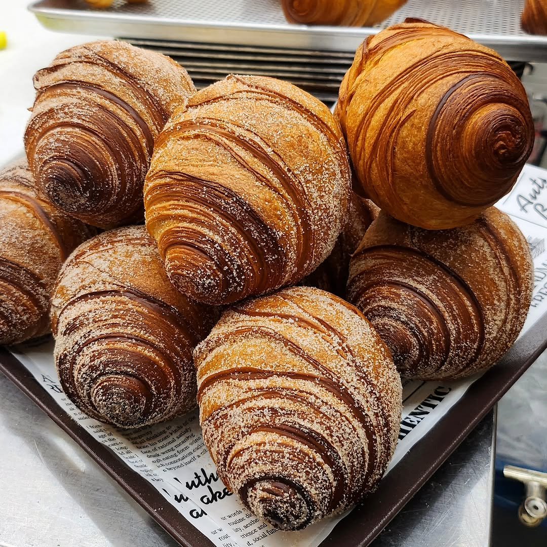 Photo by 김태현 on February 16, 2026. May be an image of turnover, babka, croissant, buns and text.