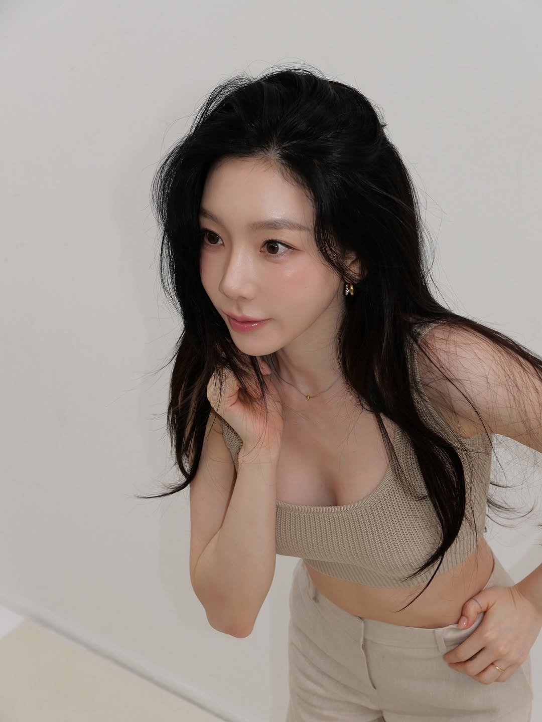 Photo by TaeYeon on August 13, 2025. May be an image of 1 person, hair, top, bra and text.