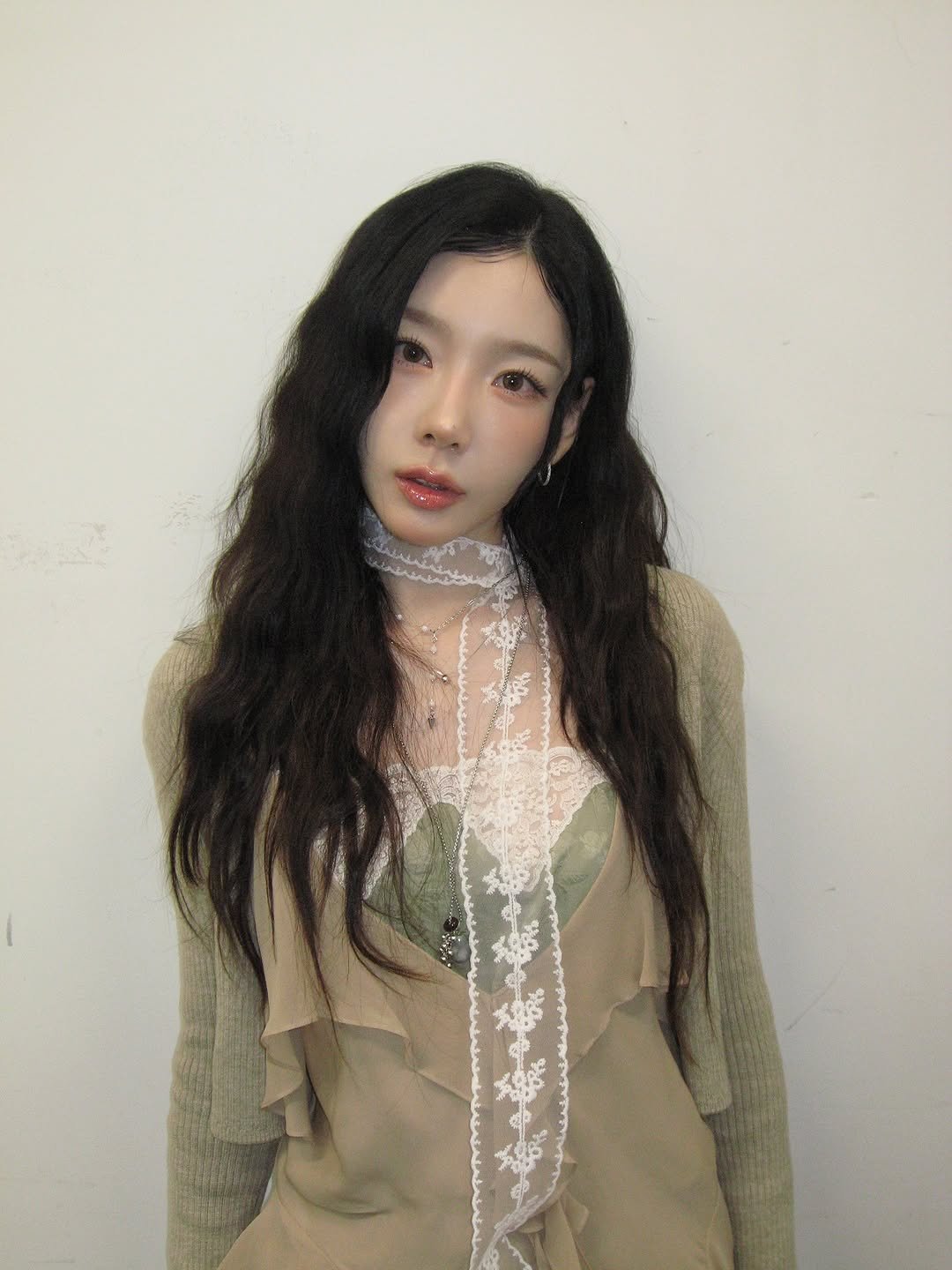 Photo by TaeYeon on October 19, 2025. May be an image of one or more people, hair, top and text.