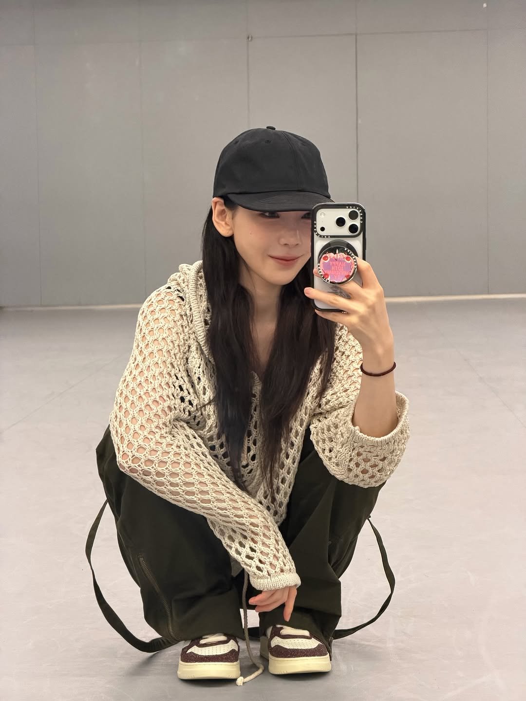 Photo by TaeYeon on October 16, 2025. May be a selfie of hat, sweatpants and text.
