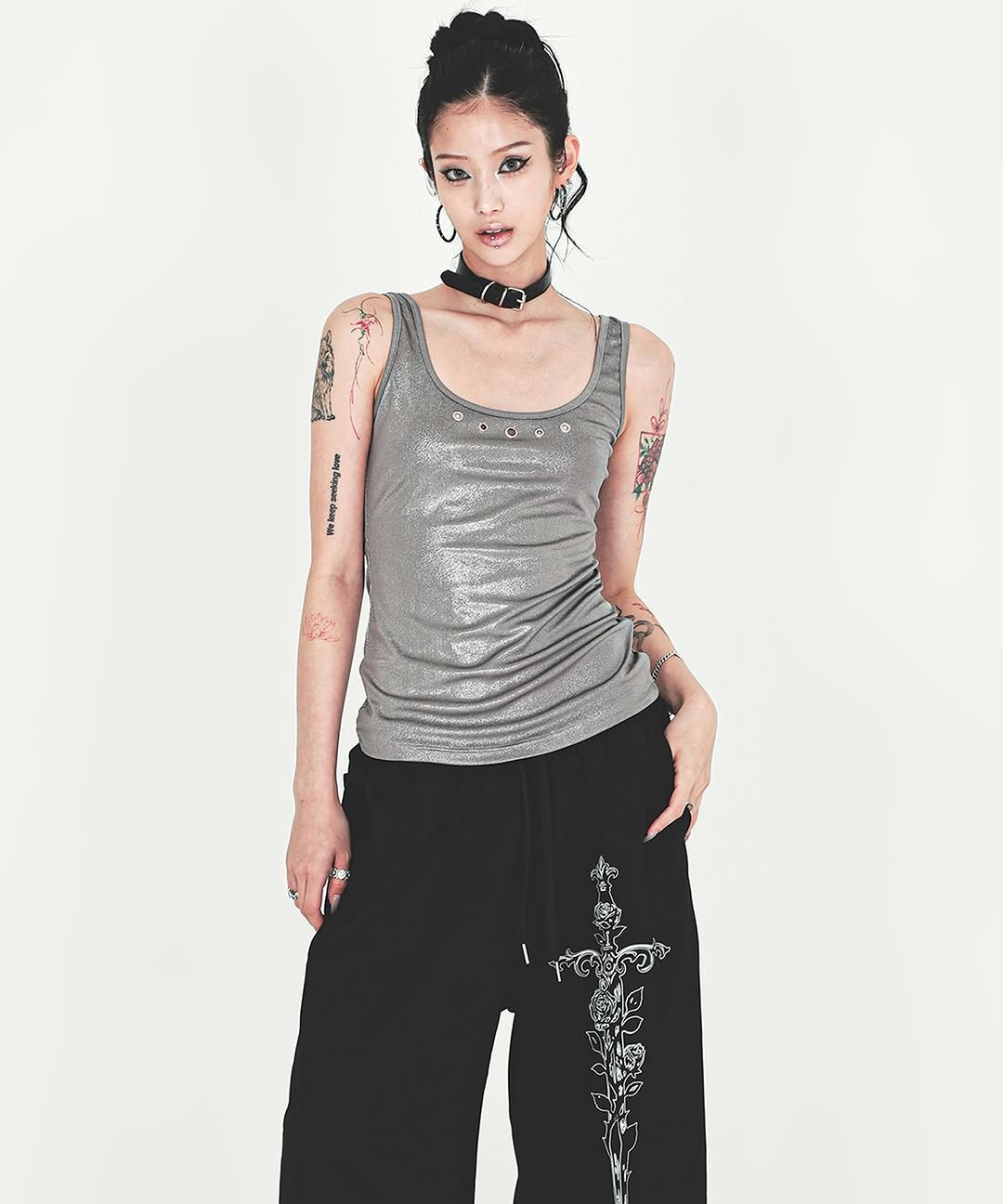 Photo shared by TAMF MGMT on August 14, 2025 tagging @shin_arin, @darlingyouarebad_official, and @tamf.mgmt. May be an image of 1 person, tanktop, sweatpants, sportswear, drawstring and text.