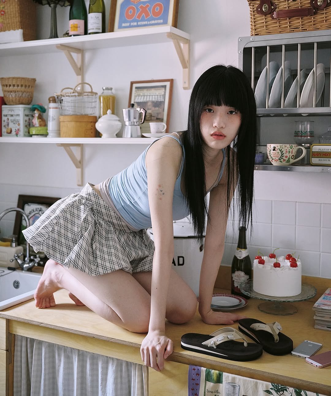 Photo shared by TAMF MGMT on August 14, 2025 tagging @23.65, @mossinyeji, and @tamf.mgmt. May be an image of 1 person, miniskirt, slingback shoes and text.
