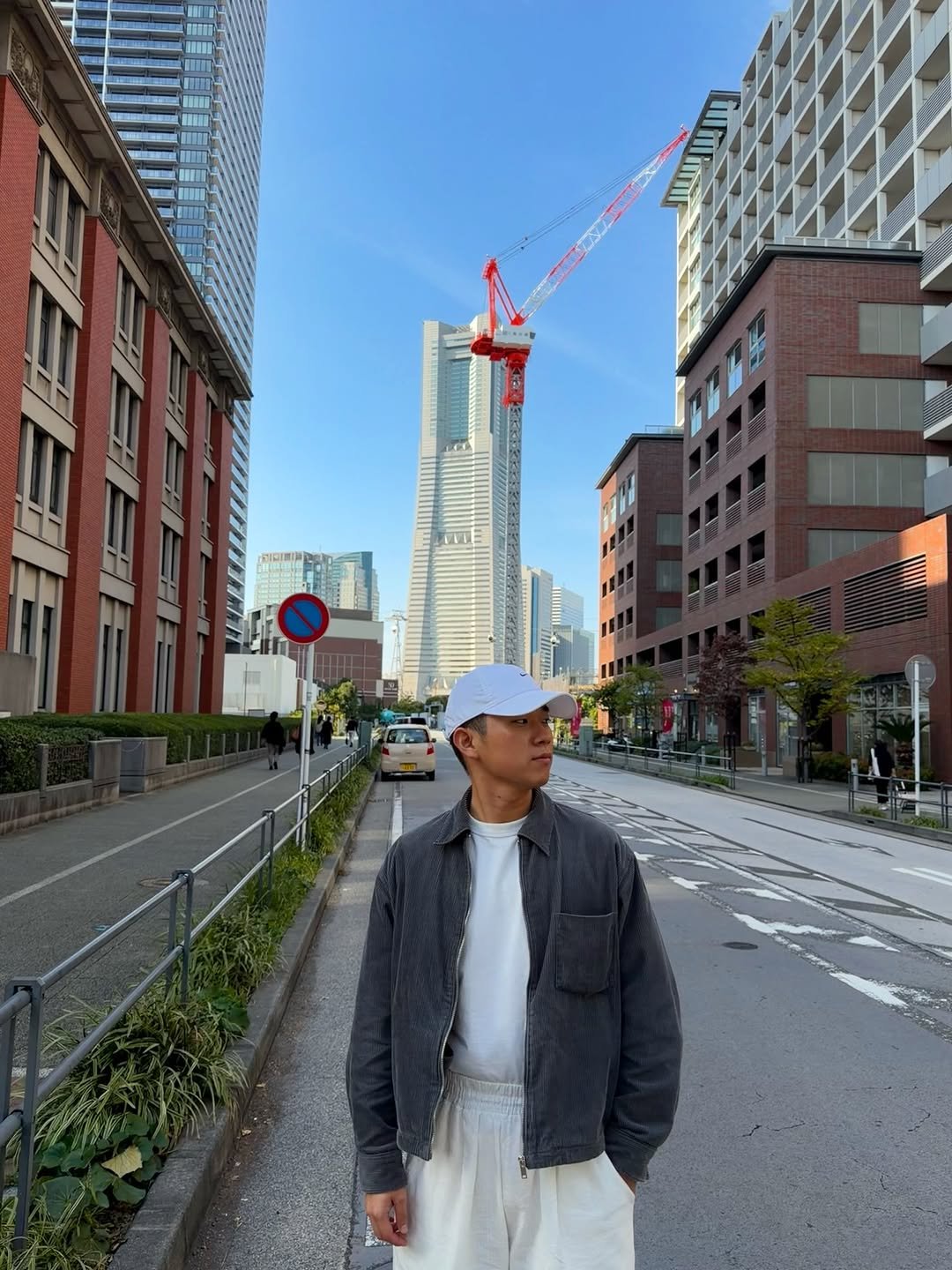 Photo by TATSUKI on November 22, 2025. May be an image of skyscraper, Tokyo Tower, street, buildings and text.