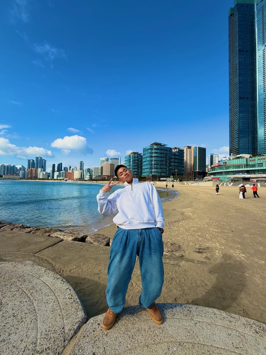 Photo by TATSUKI on December 14, 2025. May be an image of skyscraper, ocean and text.