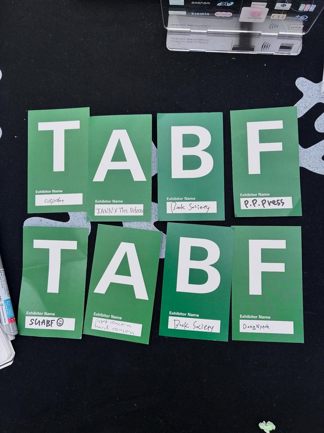 Photo by The Book Society on December 20, 2025. May be an image of ‎card and ‎text that says '‎መወ 건은 ن วรง PEDDIA ه TABF Exhibitor Namu Exhibitor Name cispeot Exhibibor Name Exhibitor Namo P.P. .p.press ANNX The Beferzi sook Sociery TA TABF B F Exchibitor Name SGABF © tttoe Soyt Exhibitor Name Exhibitor Name Exhibitor Name اام က( Book saciery ខកគ្ន ongNyed yeor‎'‎‎.