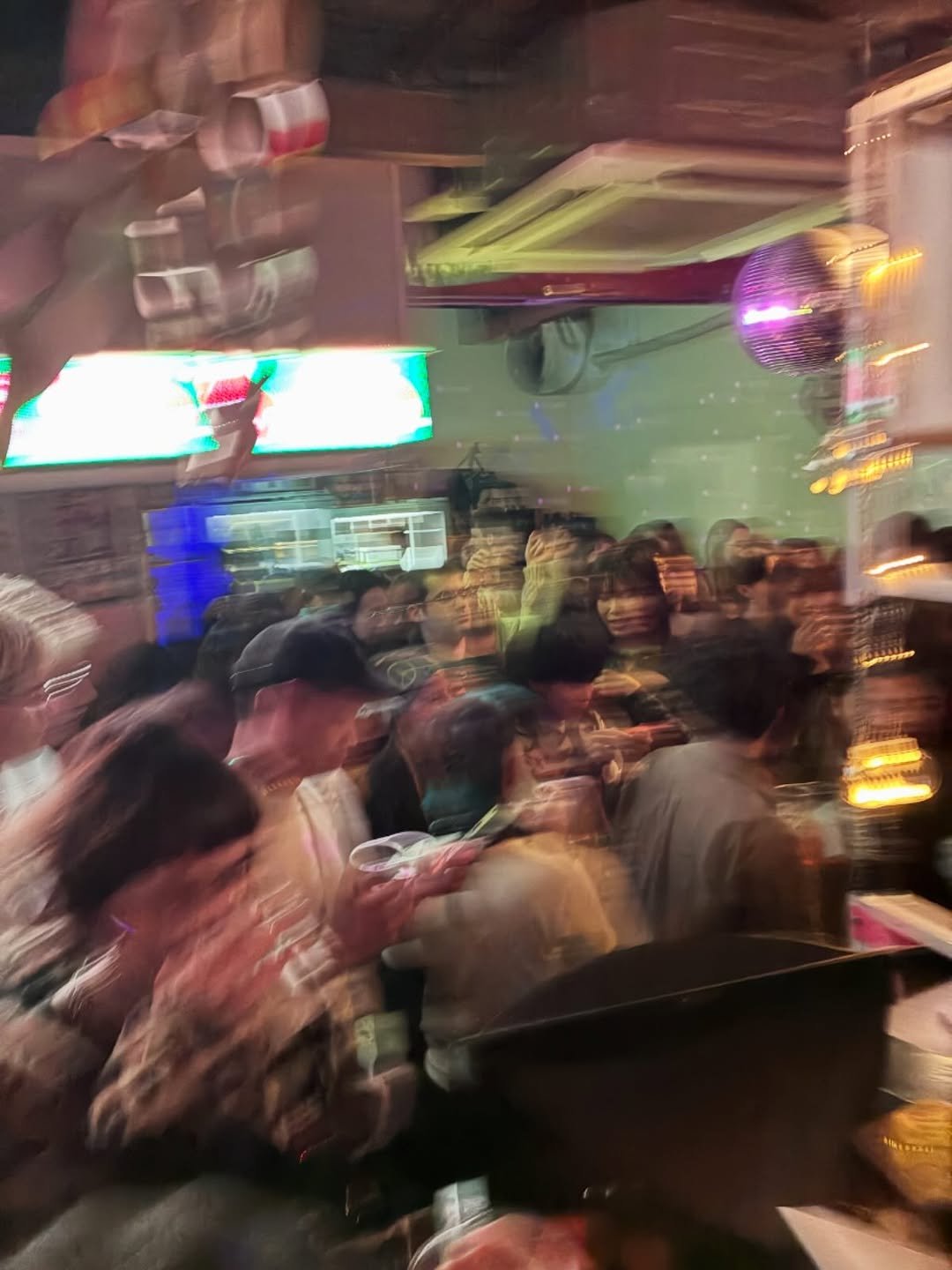 Photo by The Book Society on December 18, 2025. May be an image of one or more people, crowd, night and text.