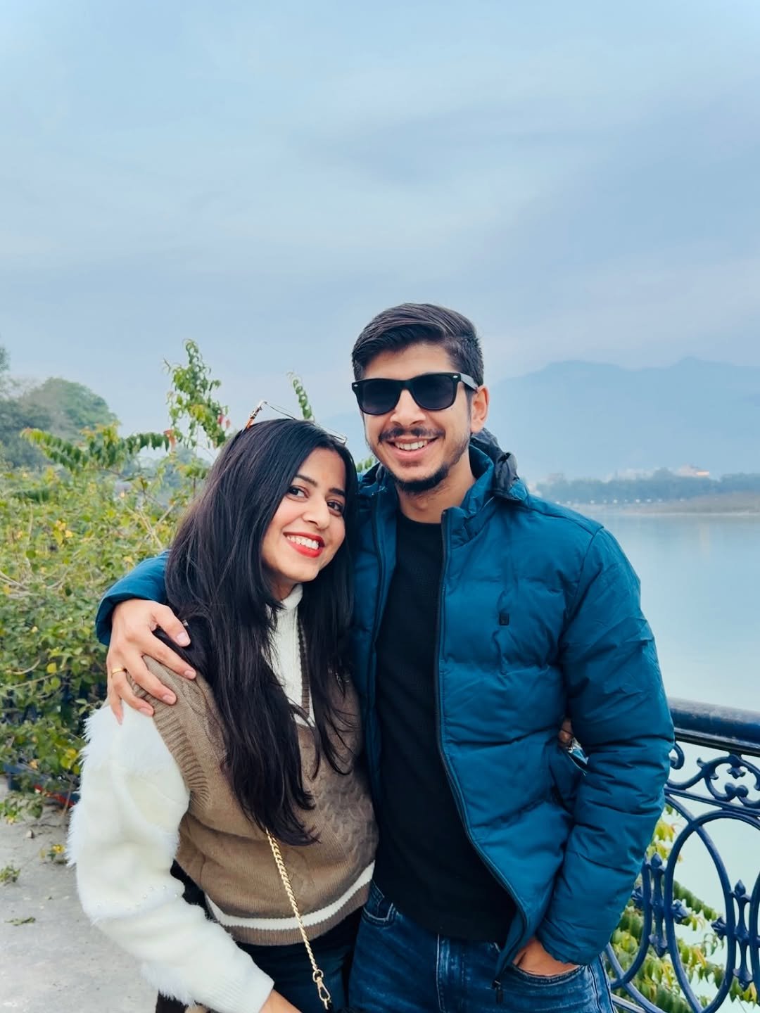 Photo shared by Jai Arora on December 15, 2025 tagging @iamjagritipahwa. May be a selfie of smiling, sunglasses, lake, park, picnic and text.