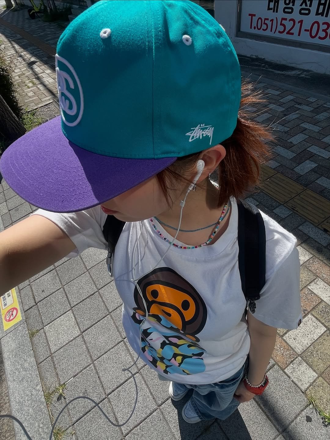 Photo by 티니TEENI on August 25, 2025. May be an image of 1 person, hat and text.