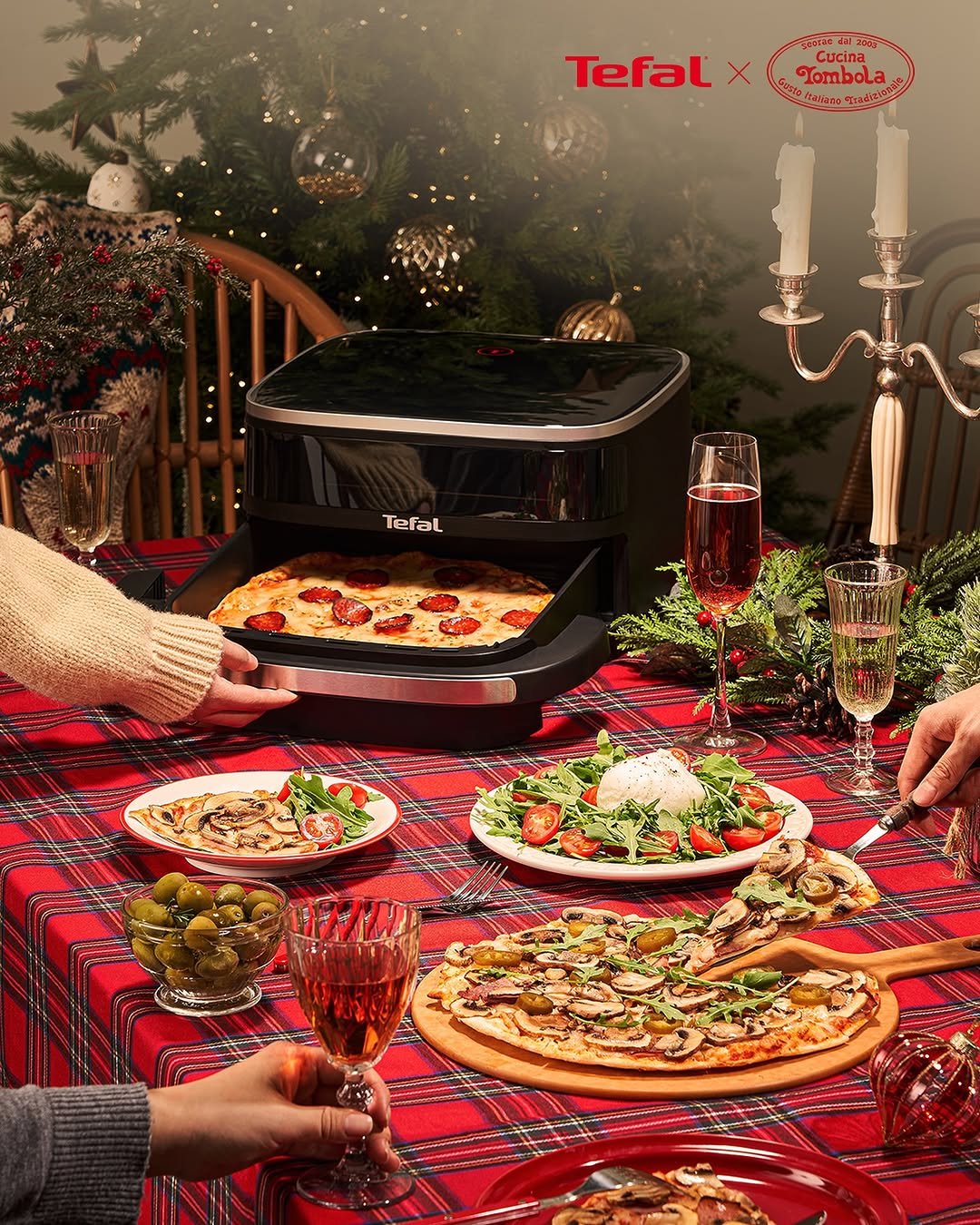 Photo shared by 테팔 공식 인스타그램 on December 07, 2025 tagging @tombola__seorae. May be an image of pizza, kitchenware, grill, stove and text that says 'Tefal Cucina Tombola iatiano Tradier Tefal'.