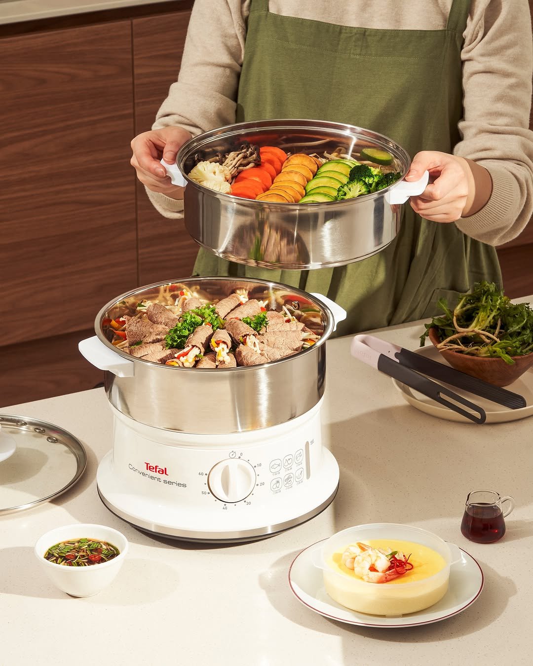 Photo by 테팔 공식 인스타그램 on April 22, 2026. May be an image of saucepan, kitchen appliance, cooker, pot, steamer, tableware and text.