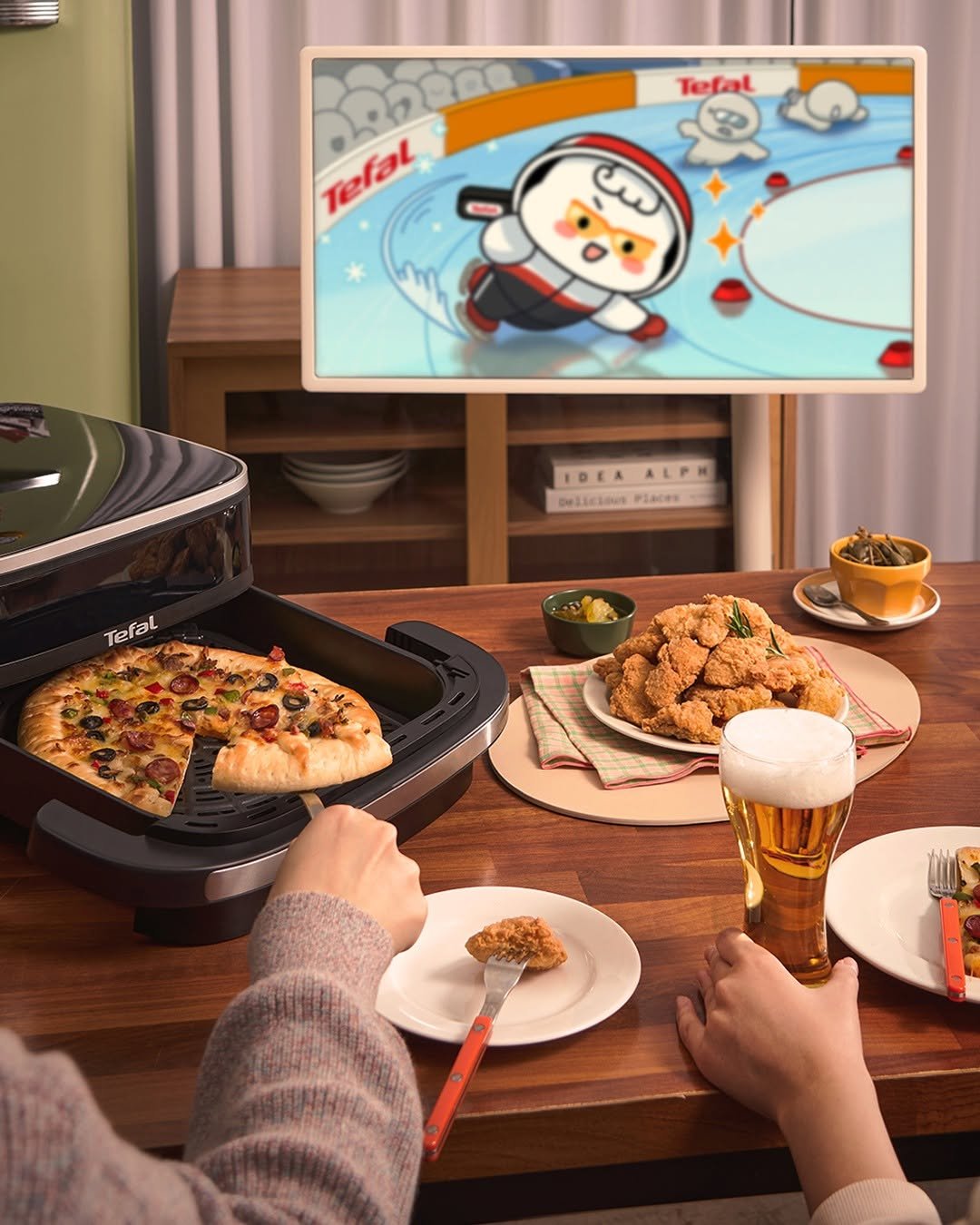 Photo by 테팔 공식 인스타그램 on February 06, 2026. May be a cartoon of pizza, tablet, chopsticks, spatula and text.