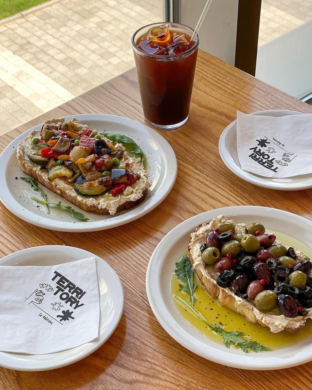 Photo shared by 송도 브런치 카페 테리토리 on September 22, 2025 tagging @territory_official_, and @vegetory_lab. May be an image of baguette, hummus, toast and text.