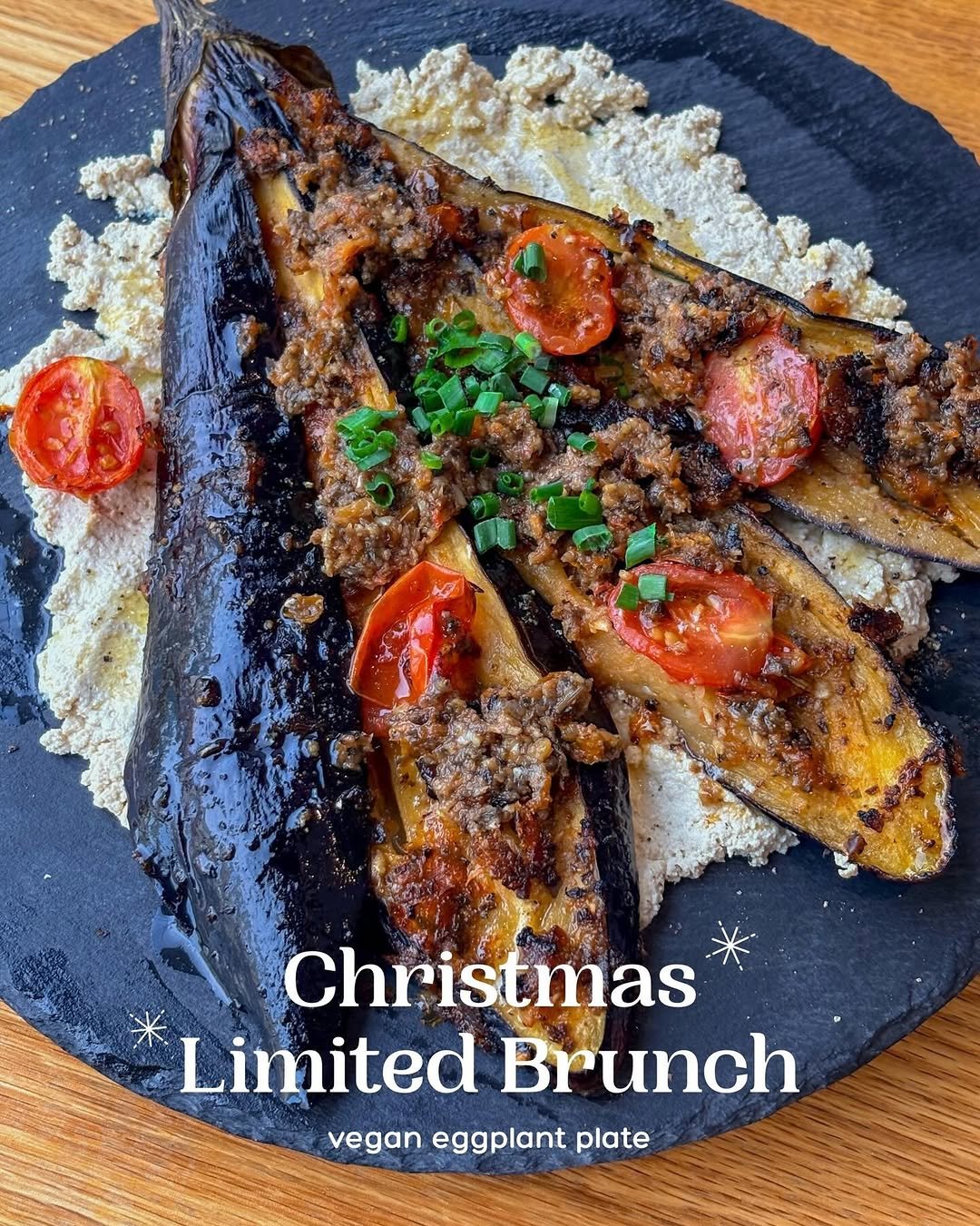 Photo by 송도 브런치 카페 테리토리 on December 18, 2025. May be an image of steak, grits, toast and text that says 'Christmas Limited Brunch vegan eggplant plate'.