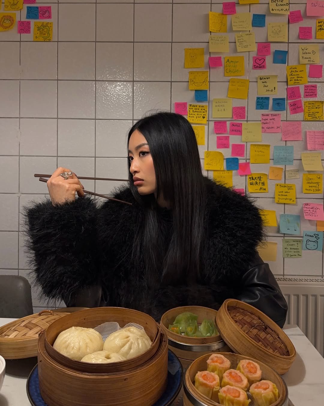 Photo by Thanya Wong on February 10, 2026. May be an image of dim sum, chopsticks, dumpling and text.