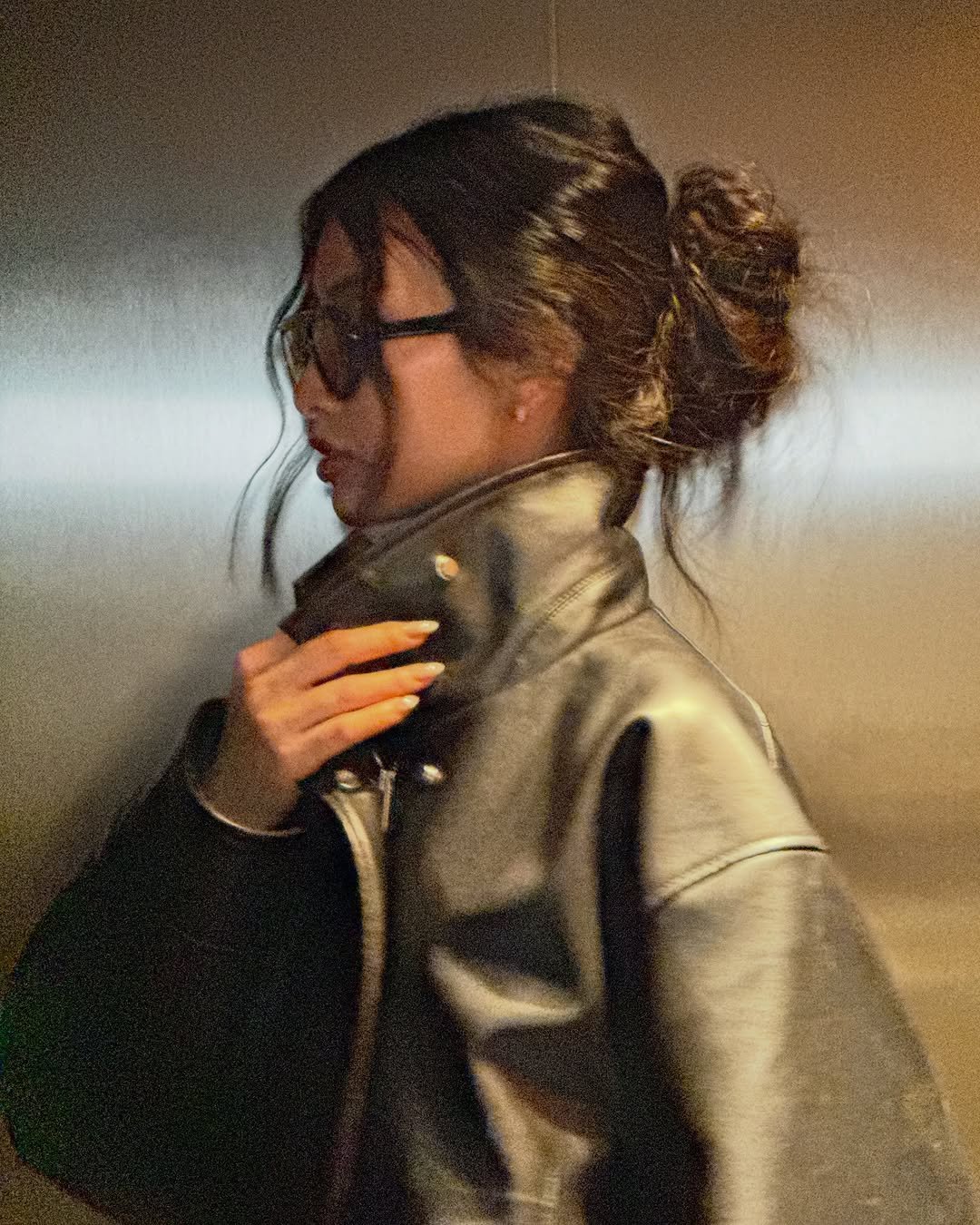 Photo by Thanya Wong on March 04, 2026. May be an image of leather, jacket, coat and text.