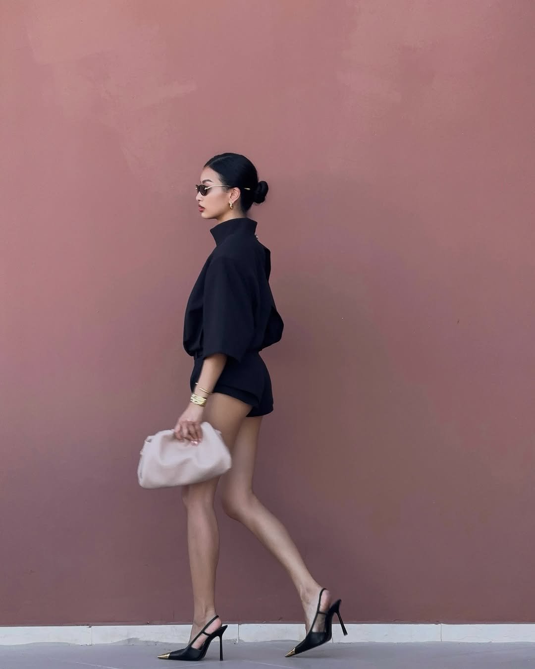 Photo by Thanya Wong on September 17, 2025. May be an image of 1 person, slingback shoes, miniskirt and text.