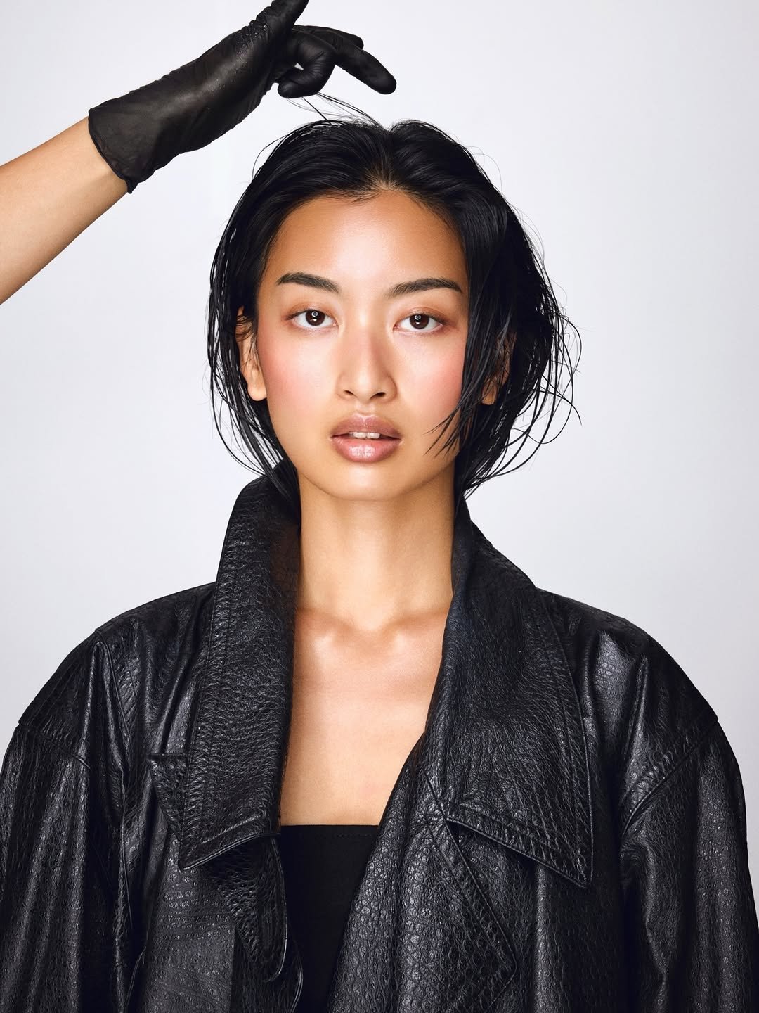 Photo by Thanya Wong on December 23, 2025. May be an image of one or more people, makeup, leather and text.