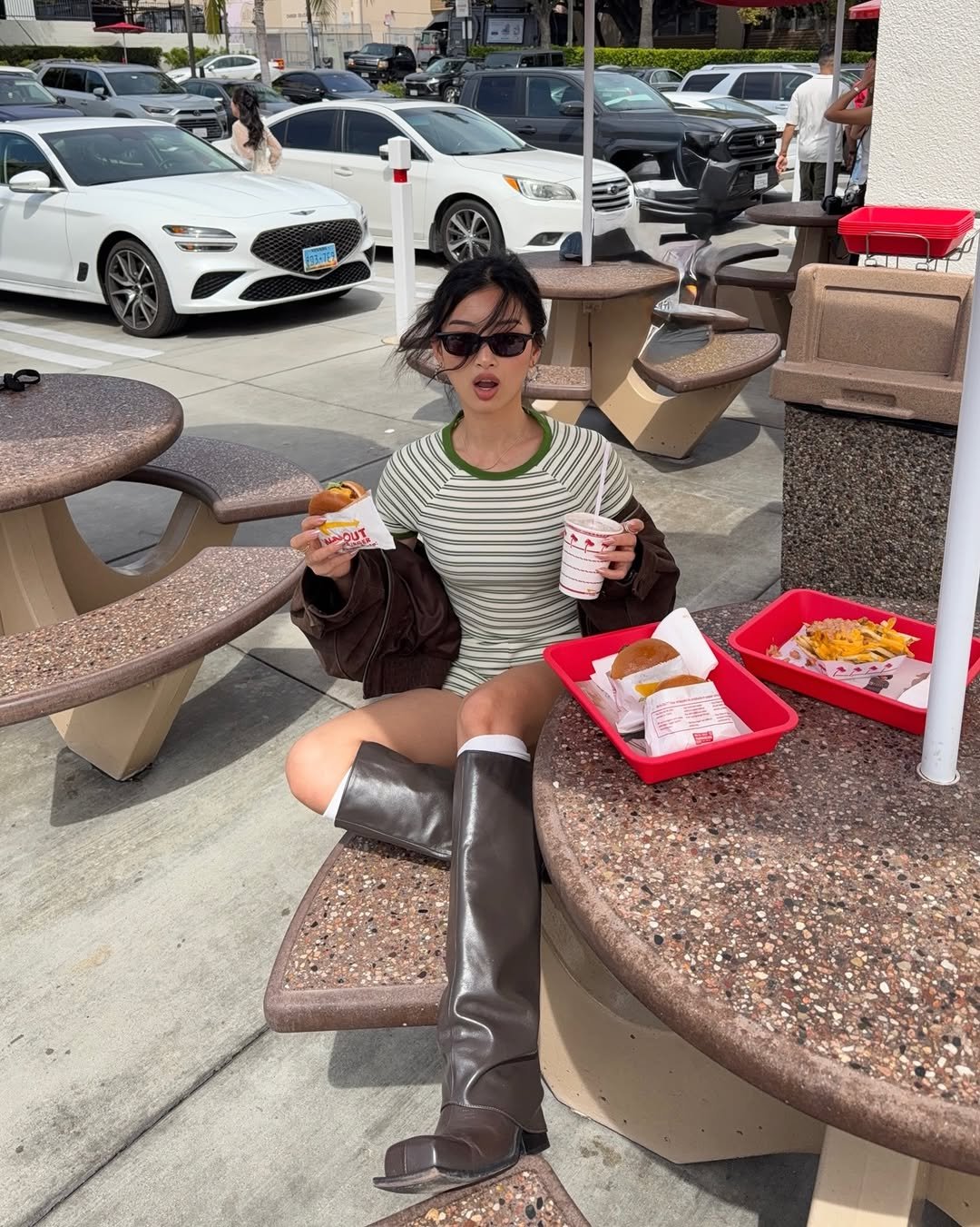 Photo by Thanya Wong on April 17, 2026. May be an image of ice cream, chicken sandwich, french fries, boots and text.