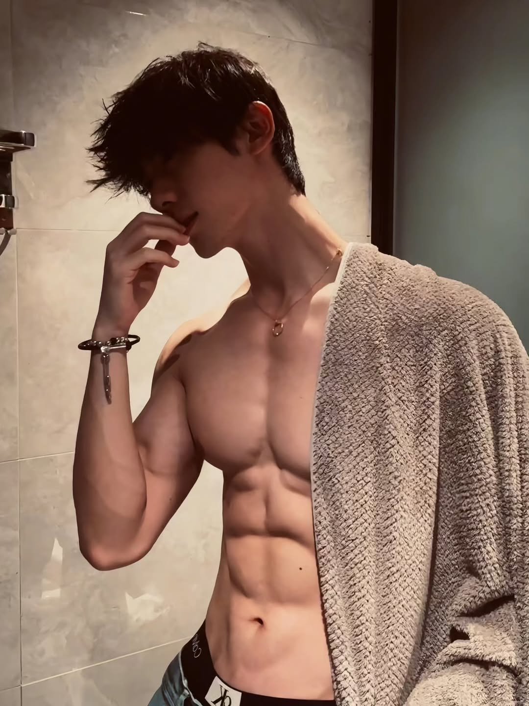 Photo shared by Anh205 on August 24, 2025 tagging @ngananh2.05. May be an image of one or more people, underwear and bath robe.