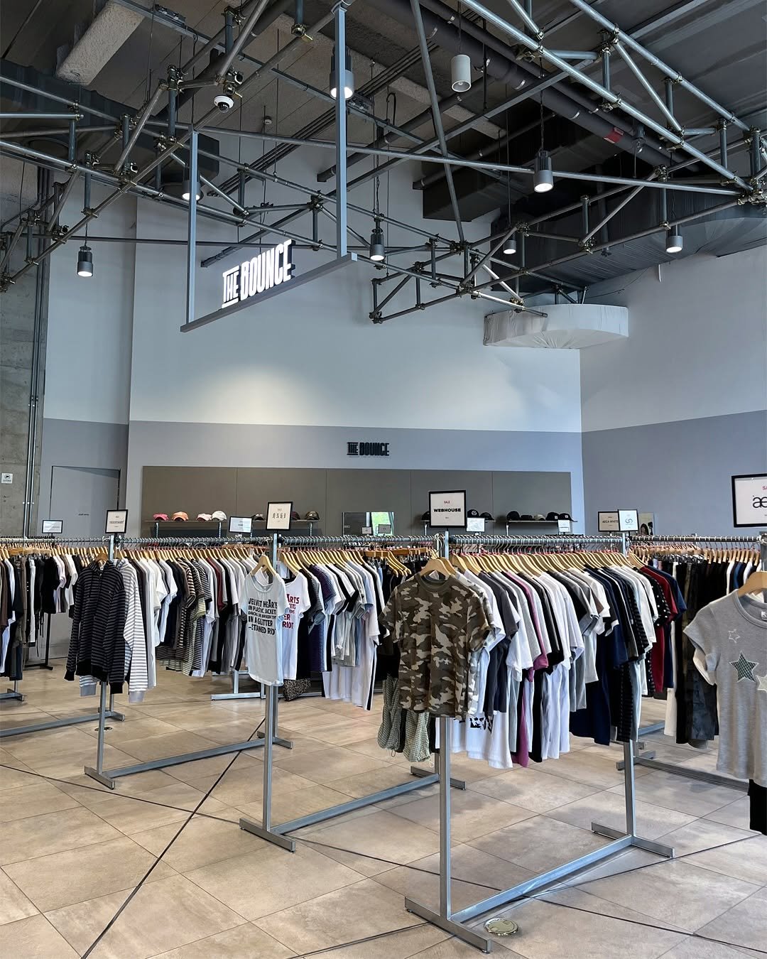 Photo by 더바운스 on September 03, 2025. May be an image of clothes hanger, rack and text.