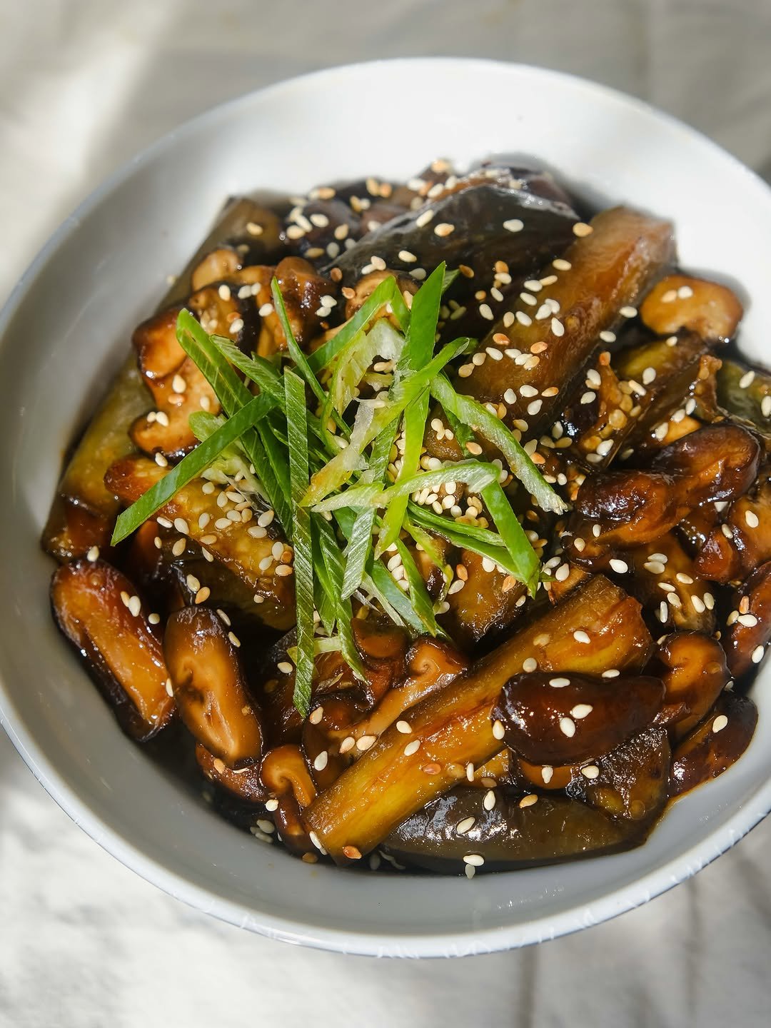 thefoodietakesflight 게시물 이미지: A mix of eggplant and mushrooms cooked in a...