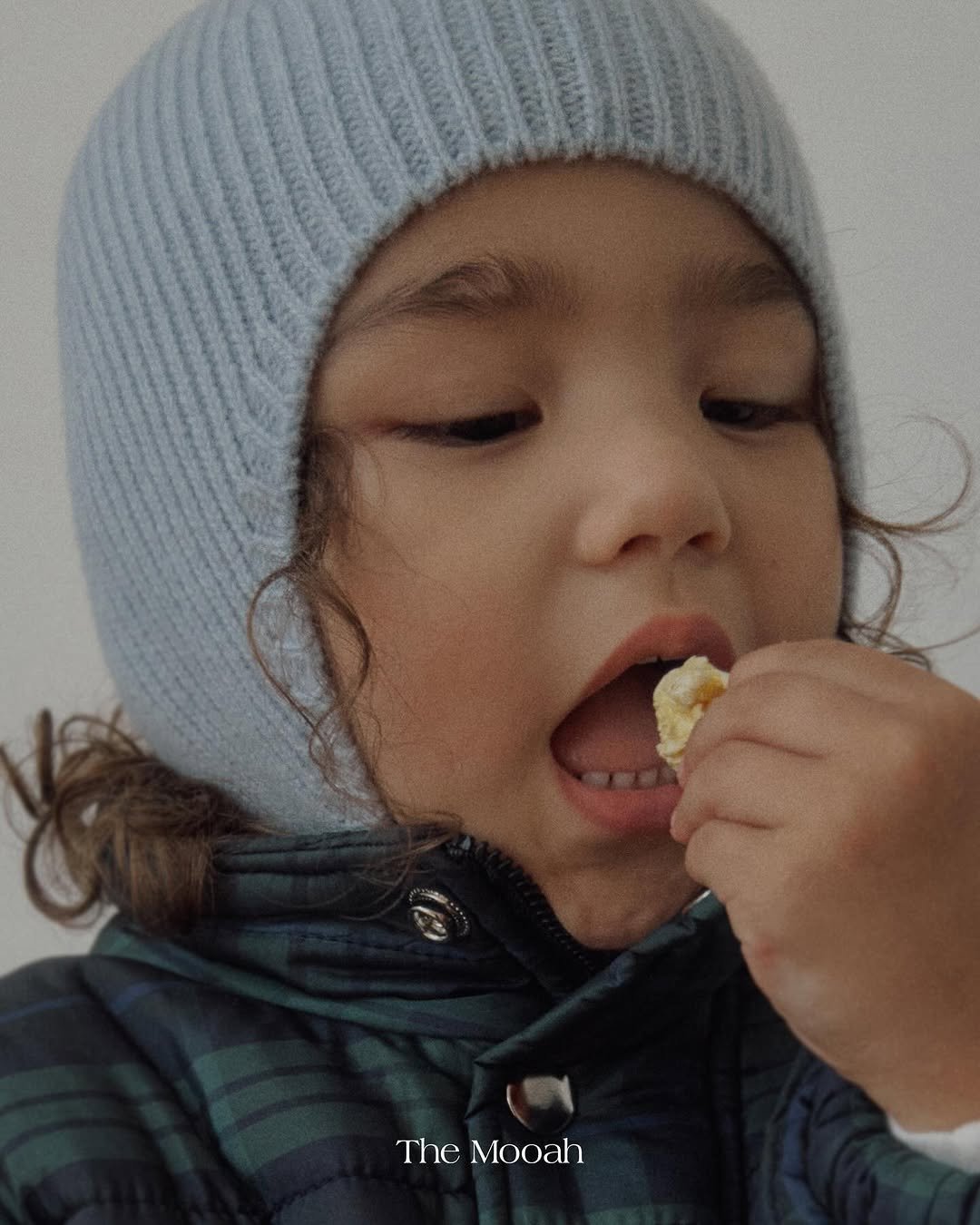 Photo by The Mooah on October 15, 2025. May be an image of child, duffle coat, popcorn and text that says 'TheMooah The Mooah'.