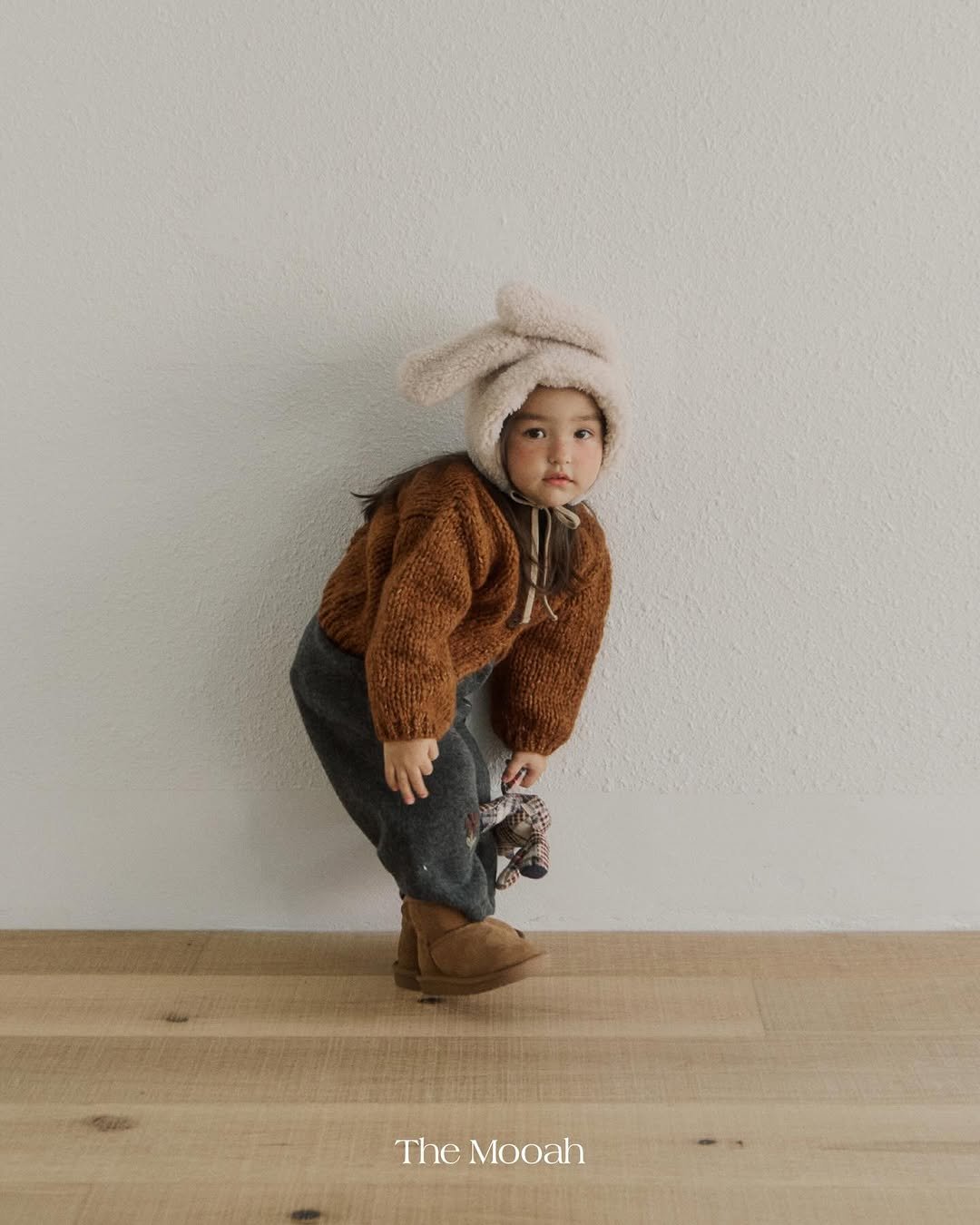 Photo by The Mooah on January 20, 2026. May be an image of baby, duffle coat, baby shoes and text that says 'The Mooah'.