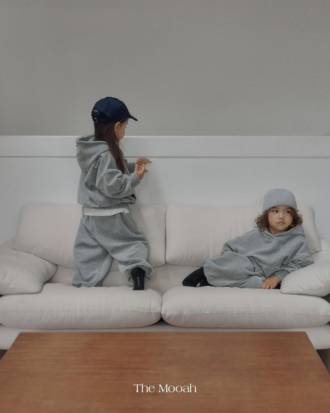 Photo by The Mooah on November 03, 2025. May be an image of child, duffle coat, goosedown coat, hat, sweatpants, sweatshirt and text that says 'TheMooah The Mooah'.