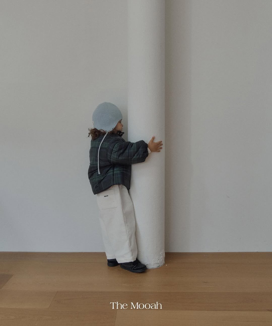 Photo by The Mooah on October 15, 2025. May be an image of child, standing, duffle coat, parka, beret and text.