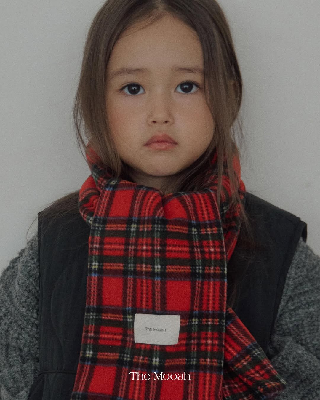 Photo by The Mooah on September 24, 2025. May be an image of 1 person, baby, hair, duffle coat, scarf, turtleneck, neckwear and text that says '/ 精器 TheMooah The Mooah TheMooah The Mooah'.