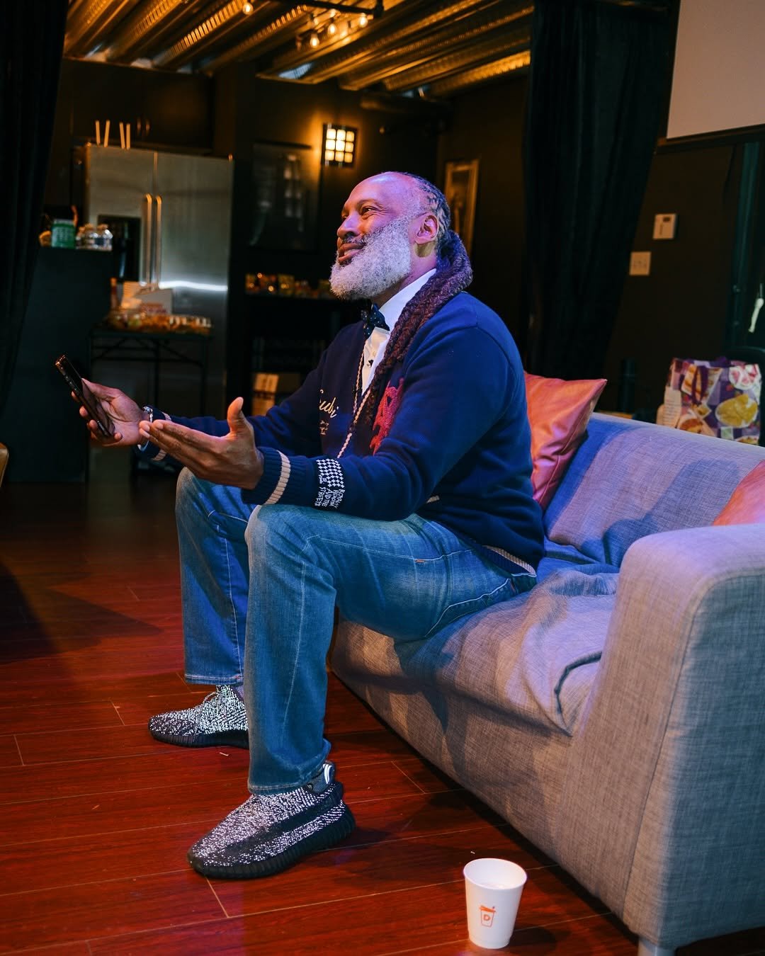 Photo by Shawn McBride | Relationship Coach on September 27, 2025. May be an image of 1 person, wrist watch, sofa, night and text.