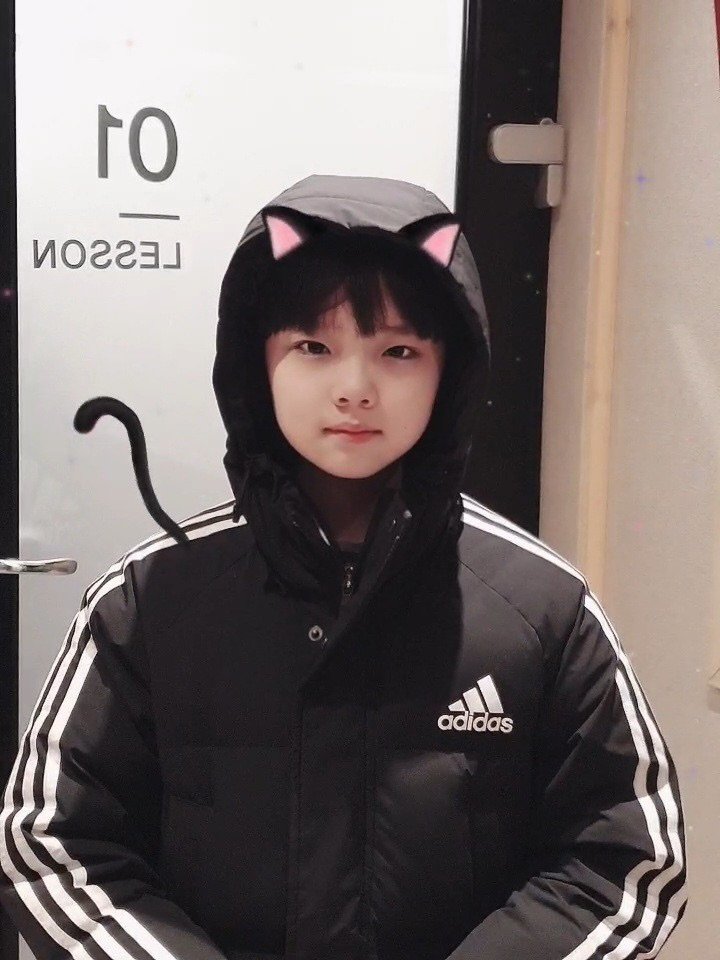 Photo by 더윈드 (The Wind) on March 21, 2026. May be an image of one or more people, bangs, duffle coat, parka and text.