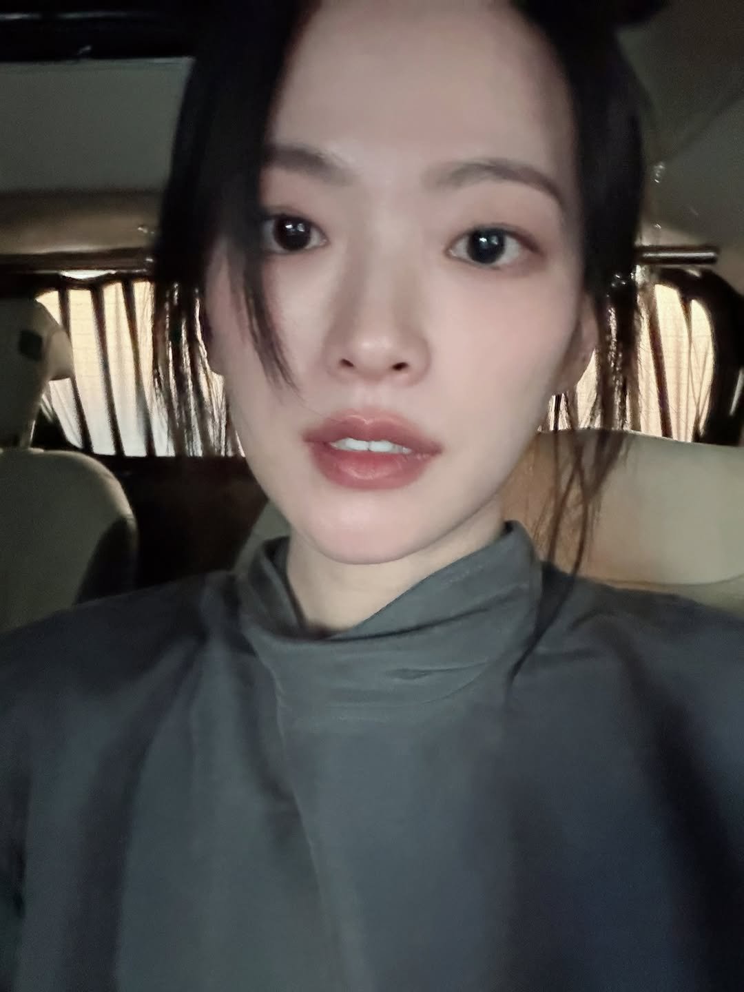 Photo by 천우희 on March 28, 2026. May be a selfie of one or more people, bangs, lipstick, makeup, turtleneck and text.