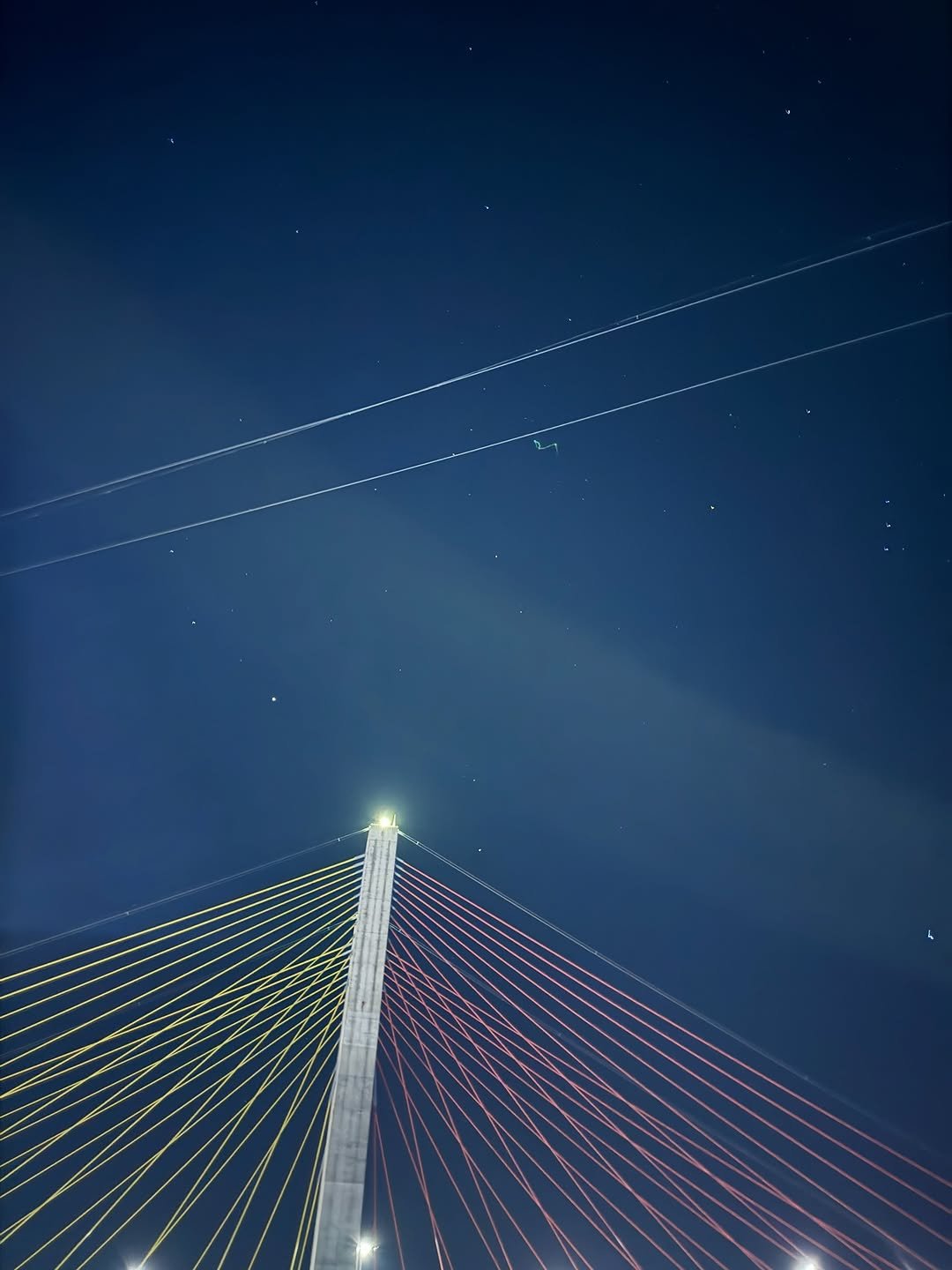 Photo shared by 샛별 on November 03, 2025 tagging @1996.3.17. May be an image of night, suspension bridge and text.