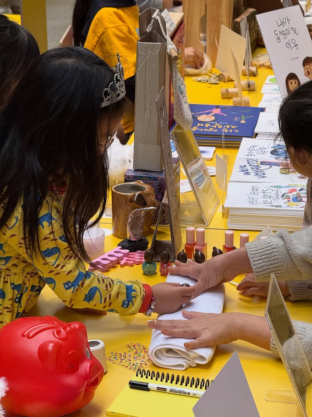 Photo by Hyun Son on October 25, 2025. May be an image of lego, newspaper and text.